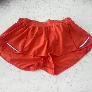 ORANGE LULULEMON SHORTS 2.5